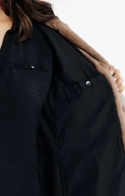 Manteau en fausse fourrure à capuche -