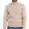 Pull beige col roulé -