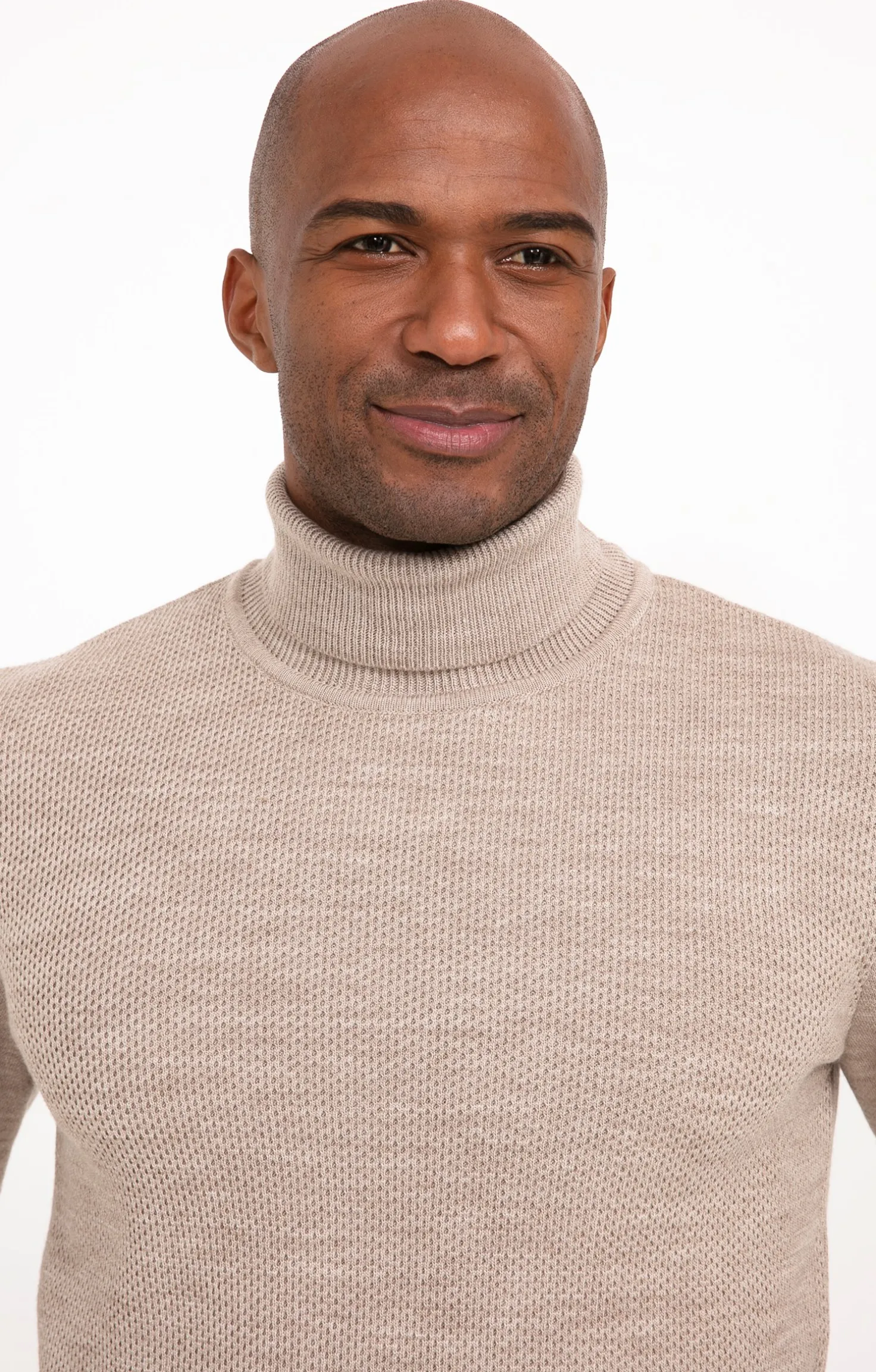 Pull beige col roulé -